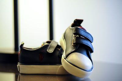 Close-up of shoes on floor