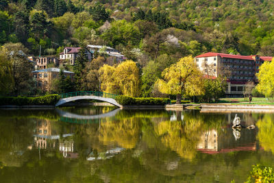 Dilijan, armenia - april 27, 2022 - beautiful view of small lake at dilijan city park on sunny day