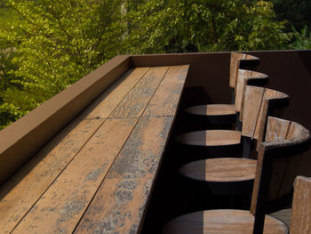 Shadow of tree on wooden table in forest