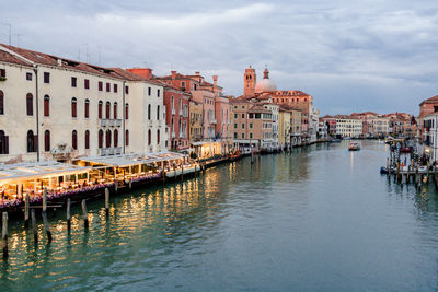 Canal passing through city buildings