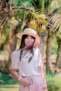 Portrait of smiling girl standing outdoors