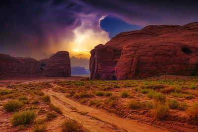 Scenic view of rocky mountains against sky during sunset