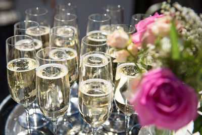 Close-up of wine glasses on table