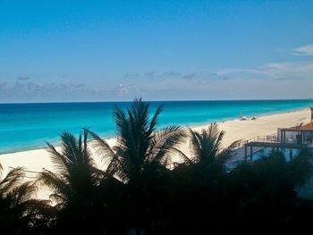 Scenic view of sea against blue sky