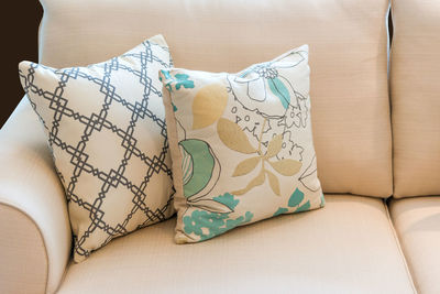 Close-up of sofa on table at home