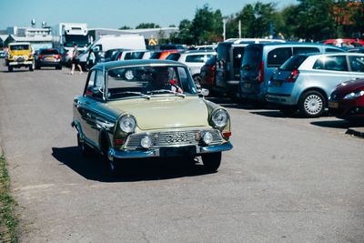 Vintage car parked on road