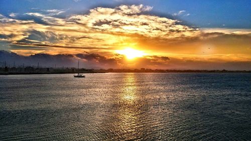 Scenic view of sunset over sea