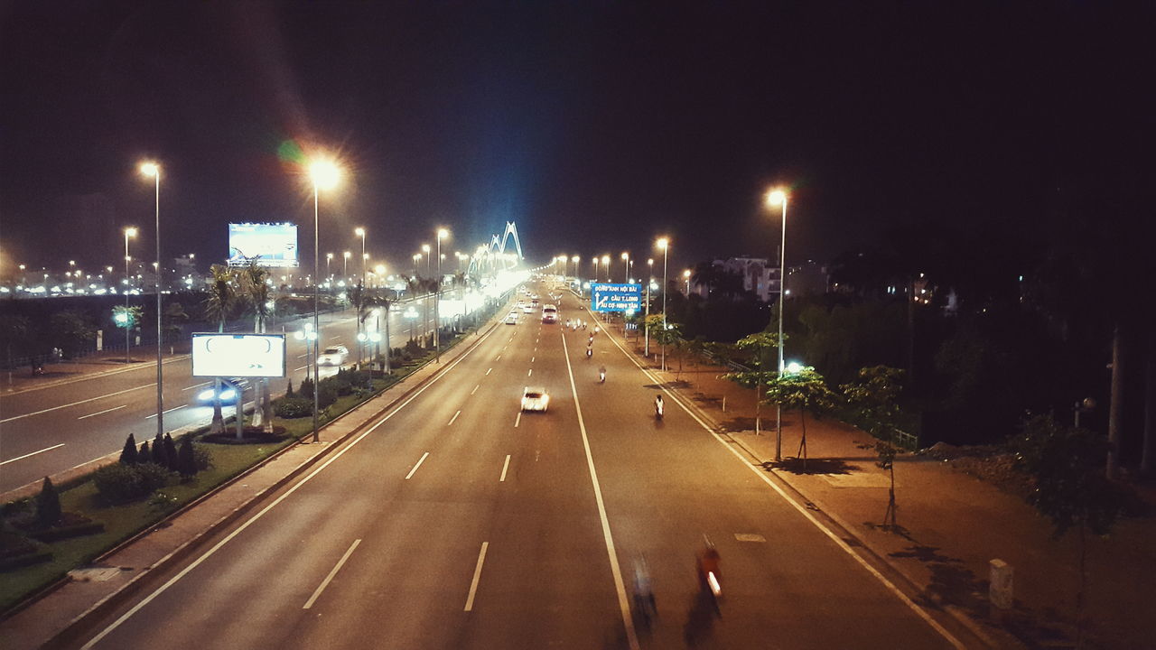 illuminated, road, transportation, night, street light, street, city, architecture, the way forward, outdoors, built structure, high street, no people, sky