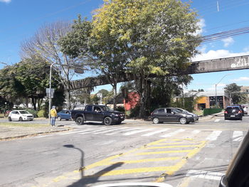 Cars on road in city