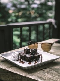 High angle view of chocolate cake in plate on table