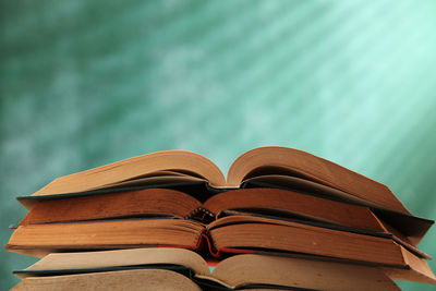 Close-up of books against wall