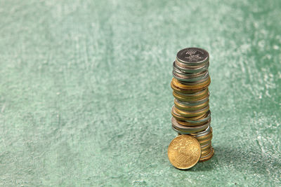 High angle view of coins on table