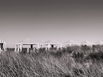 Built structure on field against clear sky