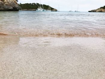 Surface level of sea against sky