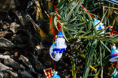 Close-up of christmas decorations hanging on tree