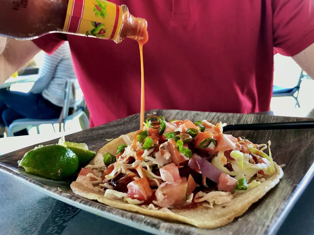 CLOSE-UP OF PERSON PREPARING FOOD