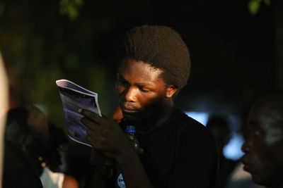 Portrait of man using mobile phone