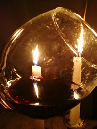 Close-up of lit tea light candle