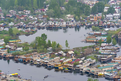 High angle view of river amidst buildings in city