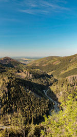 High angle view of landscape against blue sky