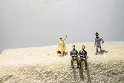 Rear view of people walking in desert