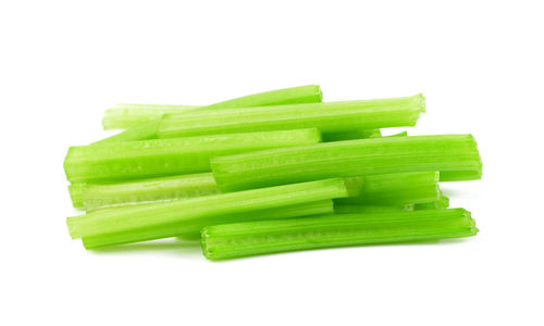 Close-up of green stack against white background