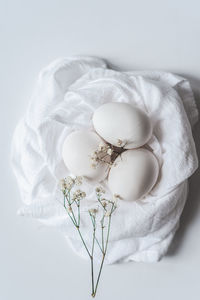 White eggs in white cloth.