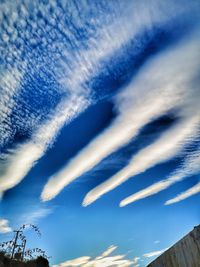 Low angle view of vapor trail in sky