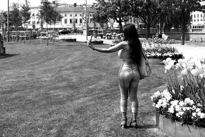 Woman standing in park