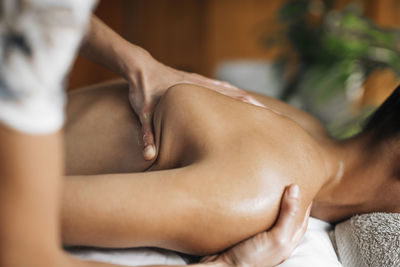 Ayurveda beck and shoulder blade massage with ayurvedic oil