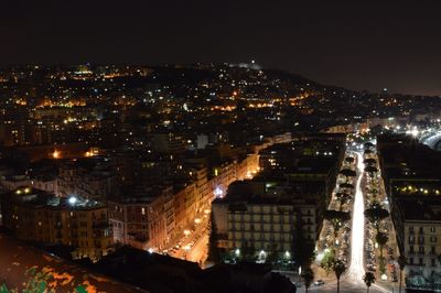 Illuminated cityscape at night