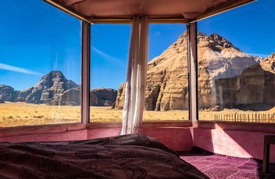 Panoramic view of landscape and desert against sky