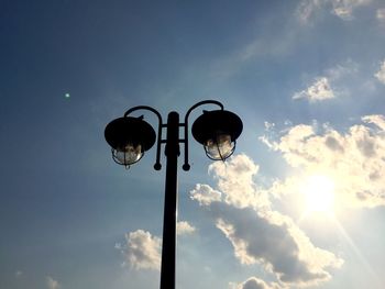 Low angle view of street light against sky