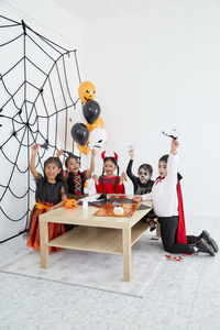 Group of people sitting on floor