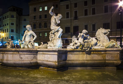 Statue of fountain in city