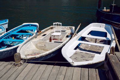 Boats moored at harbor