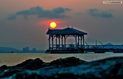 Scenic view of sea against sky at sunset