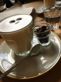 High angle view of coffee cup on table