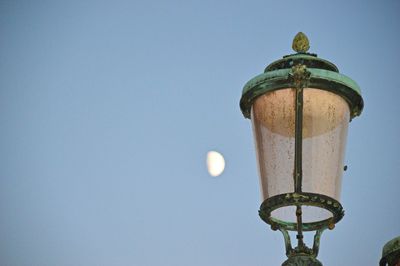 Low angle view of lamp post against clear sky