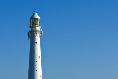 Low angle view of lighthouse against clear sky