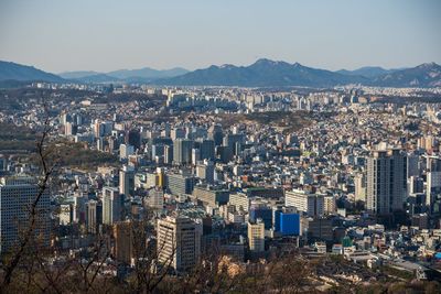 Aerial view of town against sky