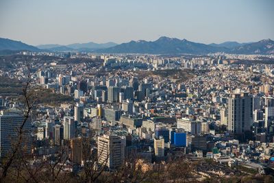 Aerial view of town against sky