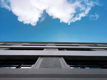 Low angle view of building against blue sky