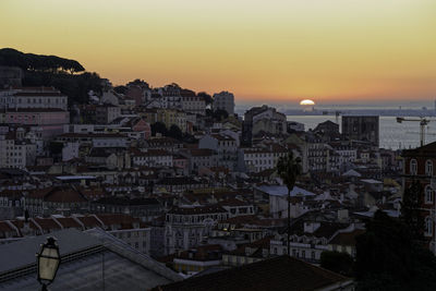 High angle view of cityscape against sky during sunset