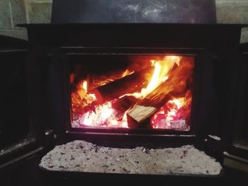 Close-up of fire in barbecue grill