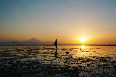 Scenic view of sea at sunset