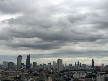 Modern buildings in city against sky