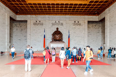 Group of people in front of building