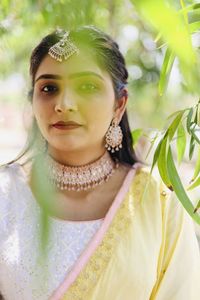 Portrait of beautiful young woman outdoors