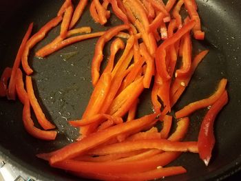 High angle view of chopped vegetables in cooking pan